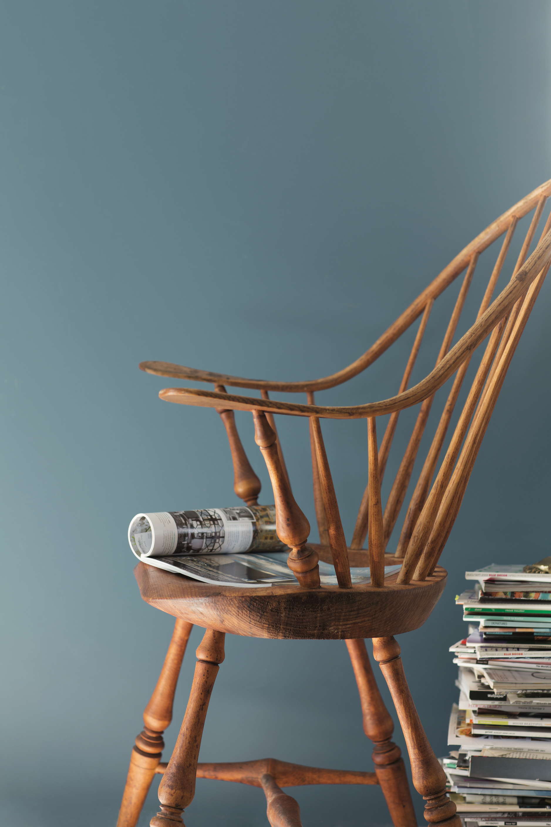 Blue_Wall_with_Windsor_Chair_and_Stack_of_Magazines (1)